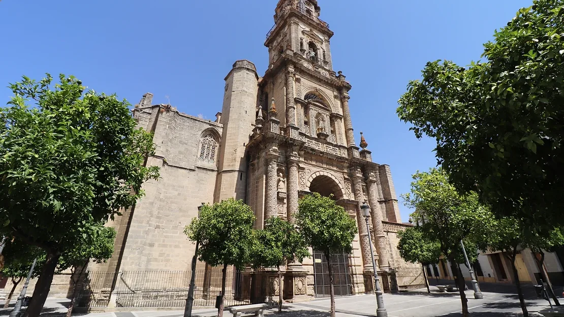 Tall bell tower attached to church in Jerez.