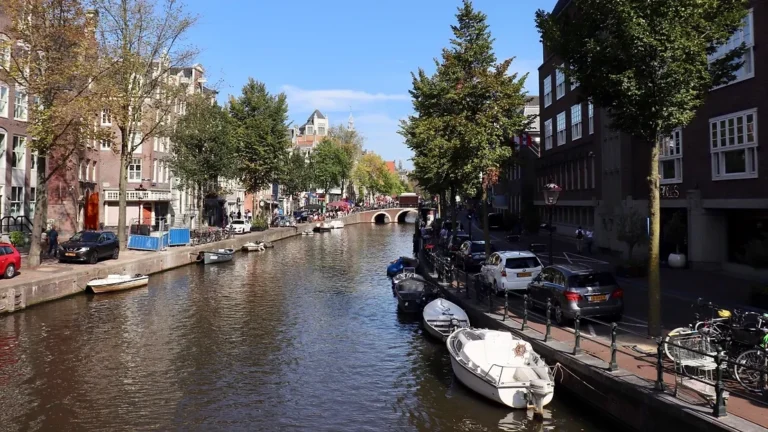 View of a canal in Amsterdam on sunny day.