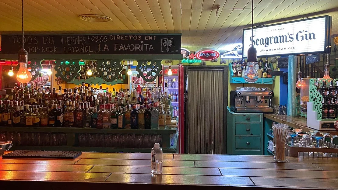 Bar in Jerez lined with spirit bottles.