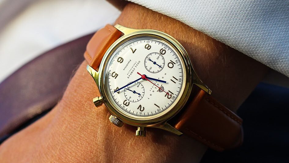 Men's watch worn on wrist.