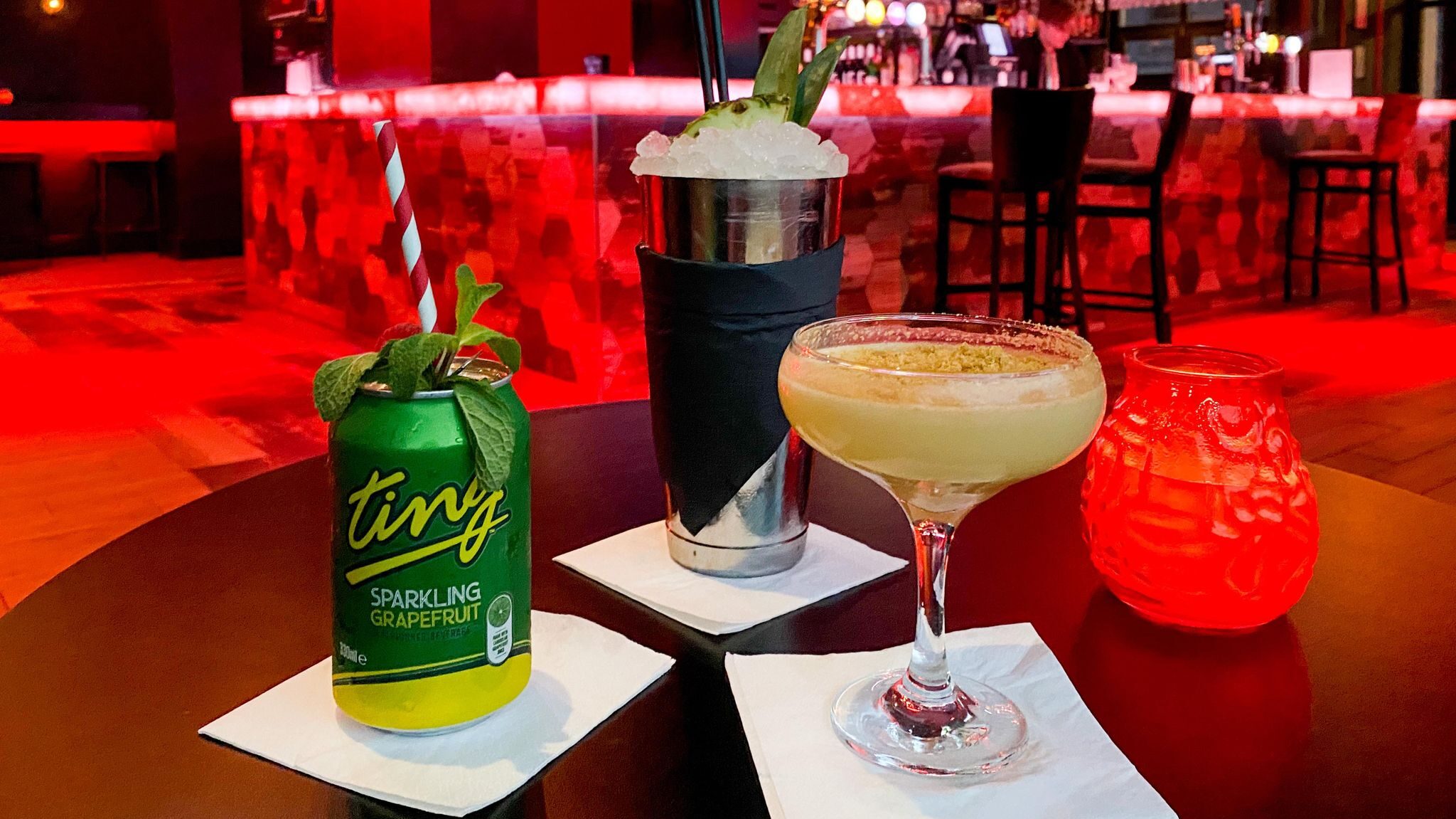 Three different types of cocktails in bar.