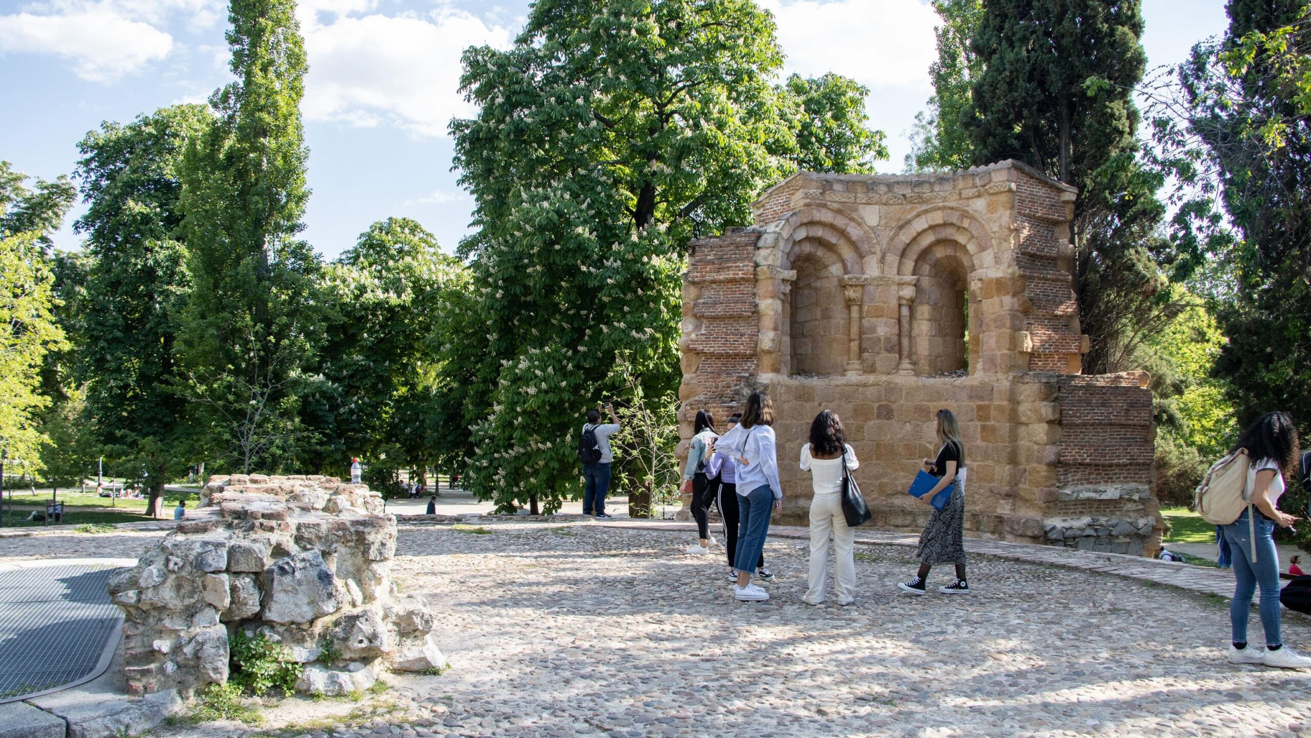 Ruins of medieval building in park.