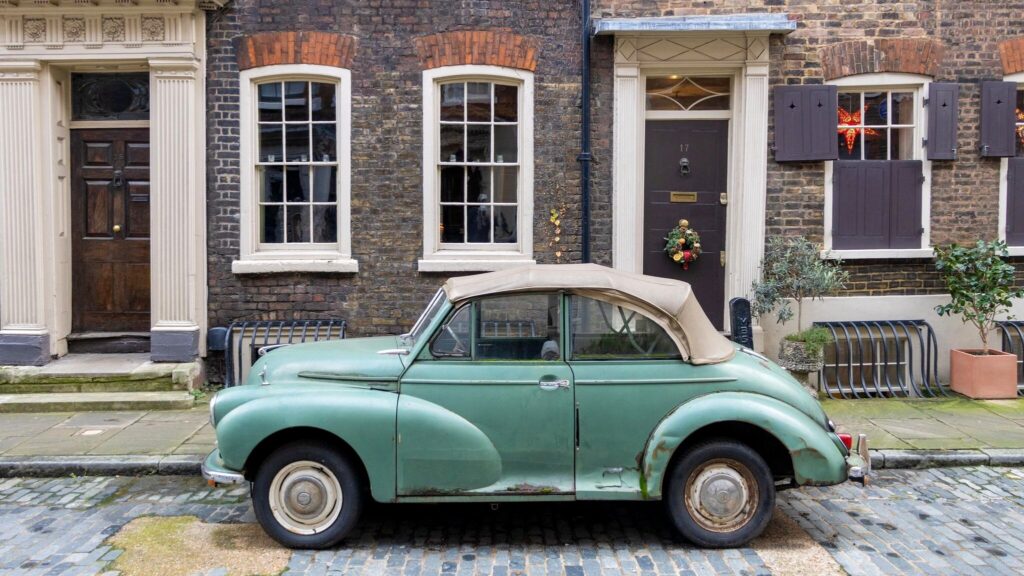 Historic street in Spitalfields with vintage car.
