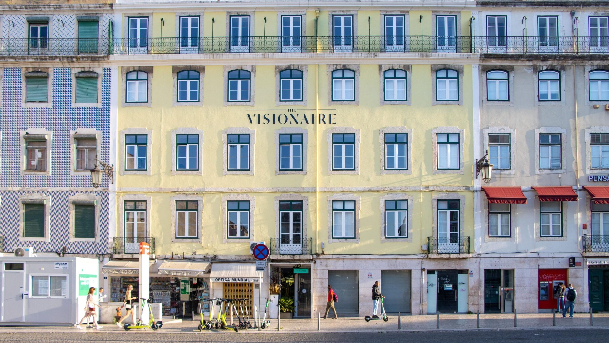 Exterior of 5-star hotel in Lisbon painted yellow.