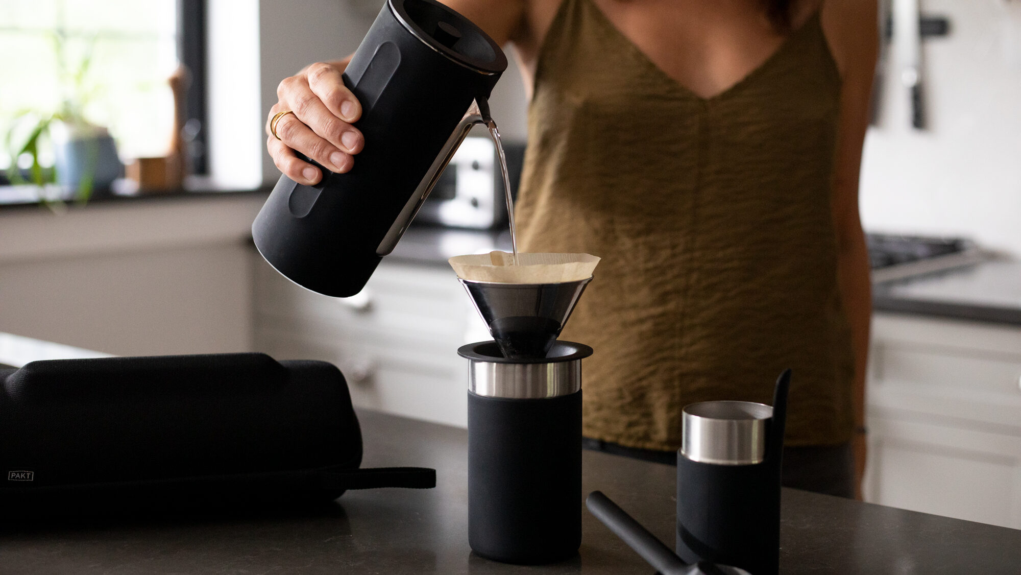 Portable espresso maker in kitchen.