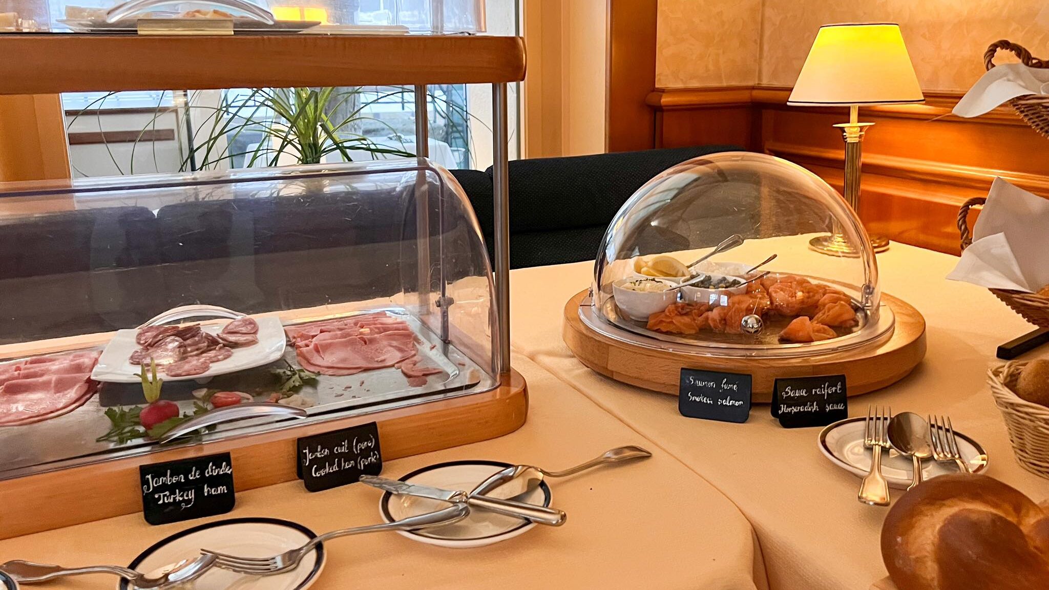 Continental breakfast spread in hotel.