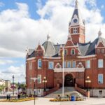 Large city hall building in centre of town.