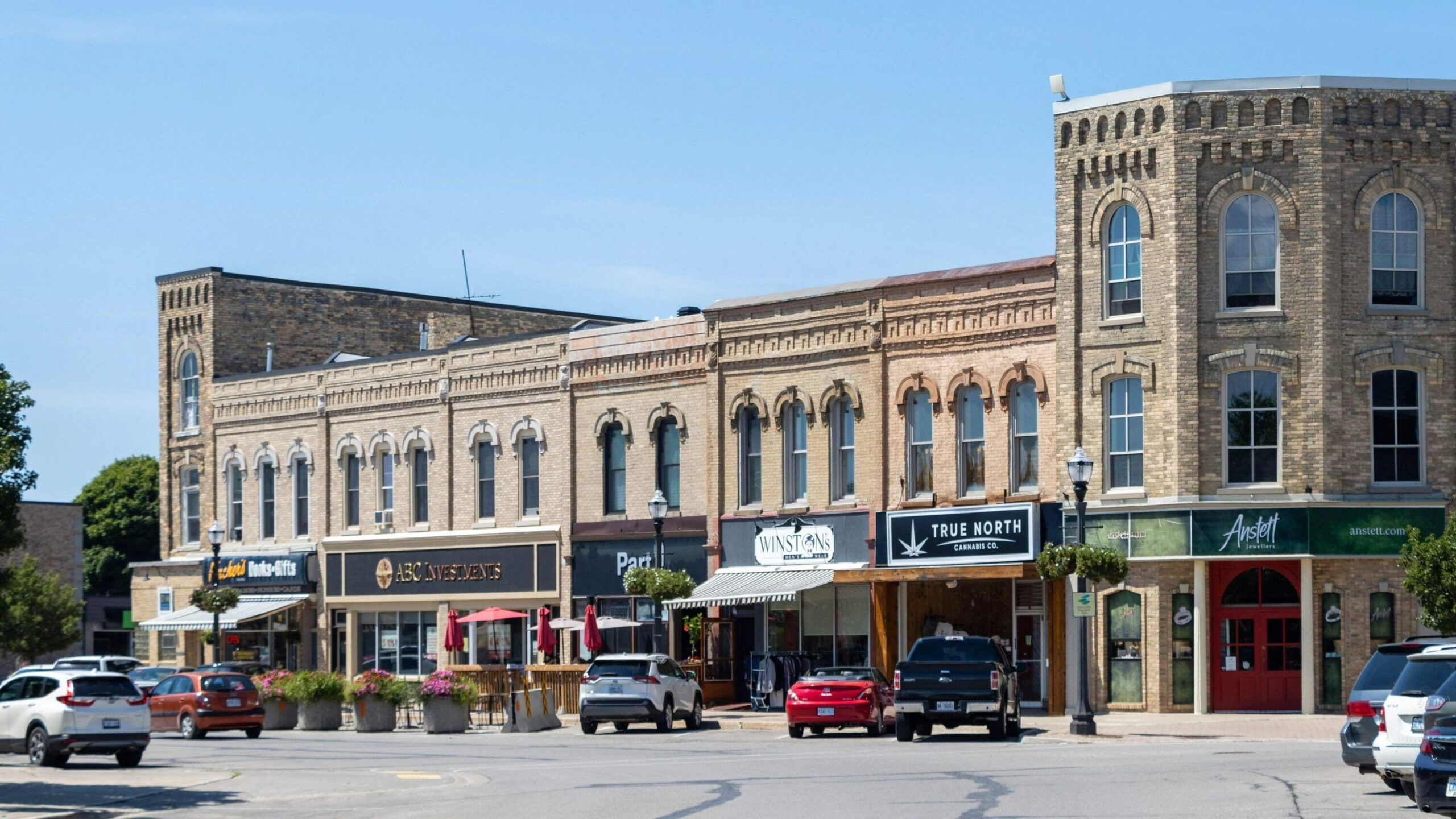 Large open square in Goderich with shops.