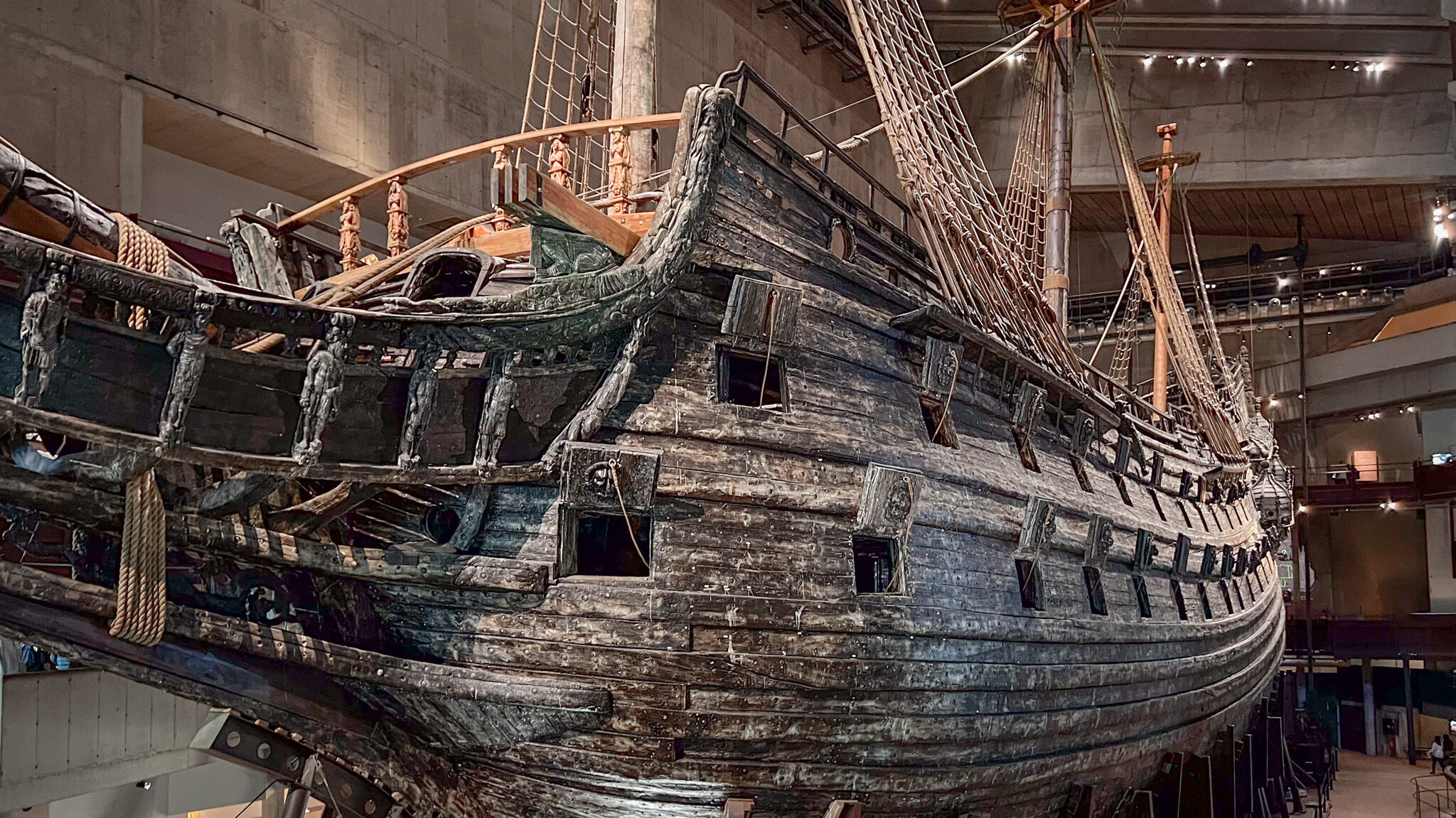 Large wooden war ship on display.