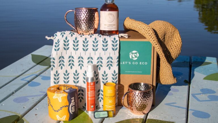 Subscription box with summer goods on deck.