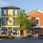 Historic buildings on Queen Street at sunrise.