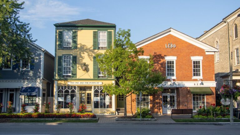 Historic buildings on Queen Street at sunrise.