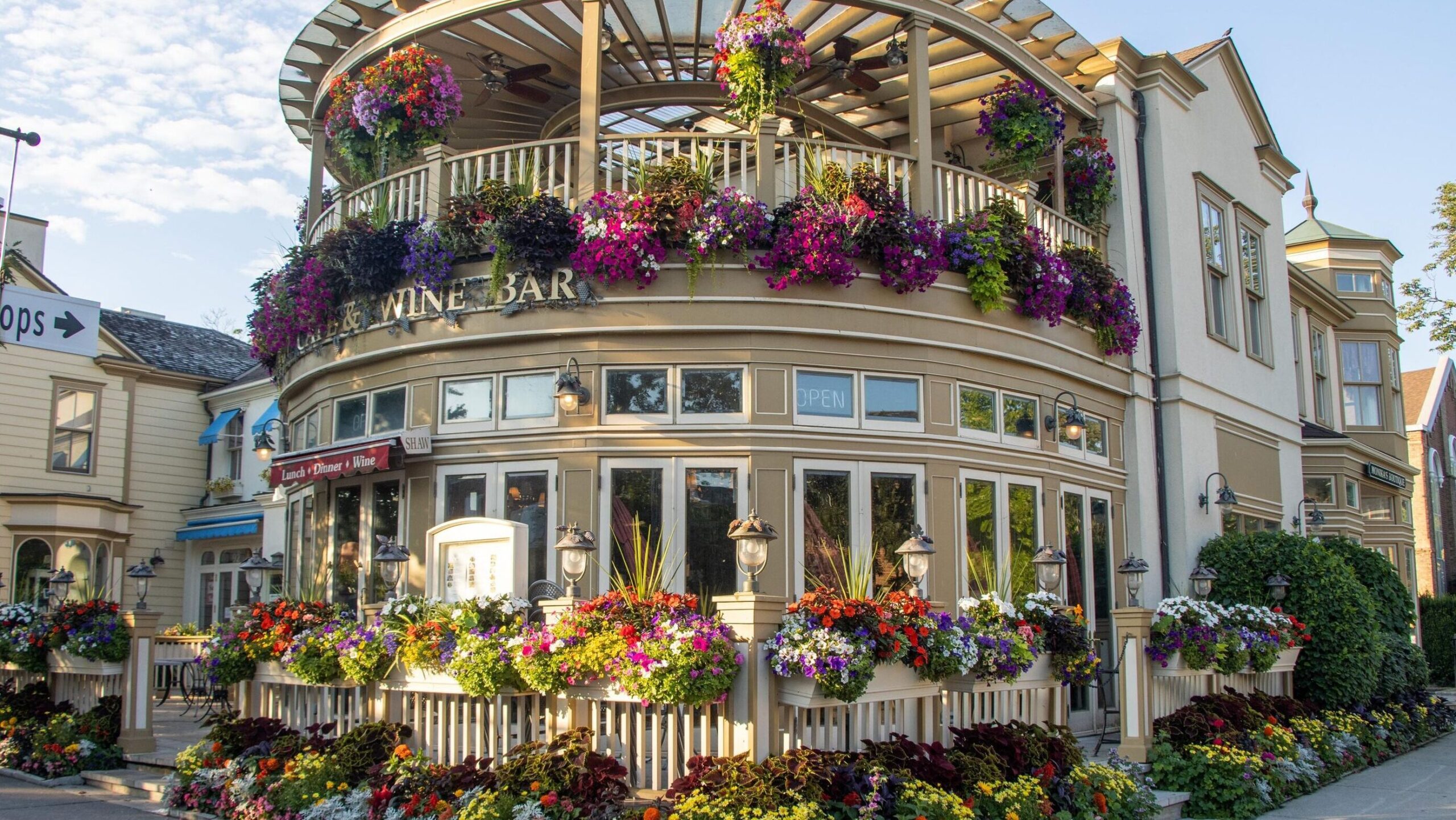 Cafe in Niagara covered in flowers outside.