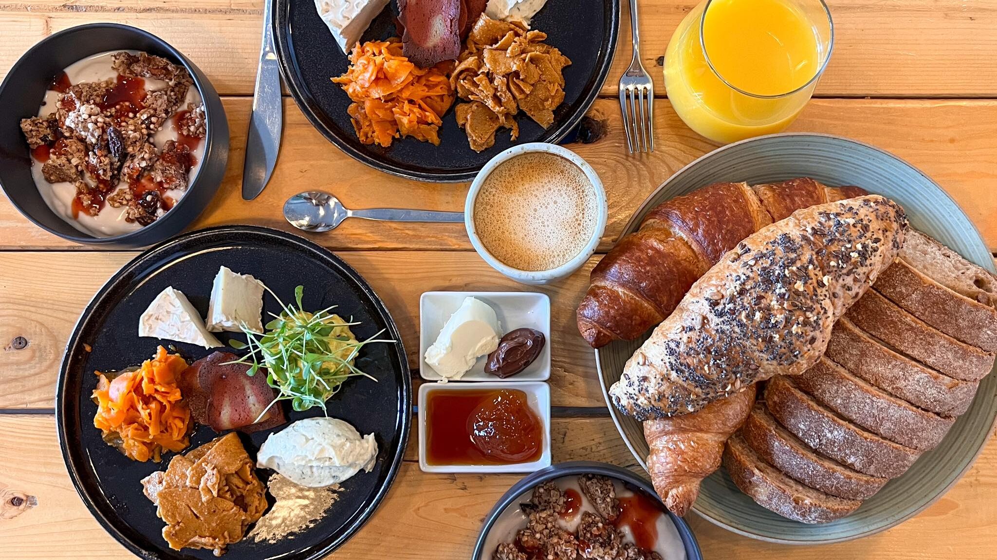 Selection of vegan food on wooden table.