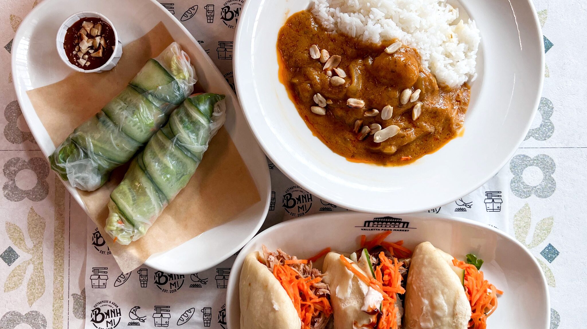 Asian dishes with spring rolls.