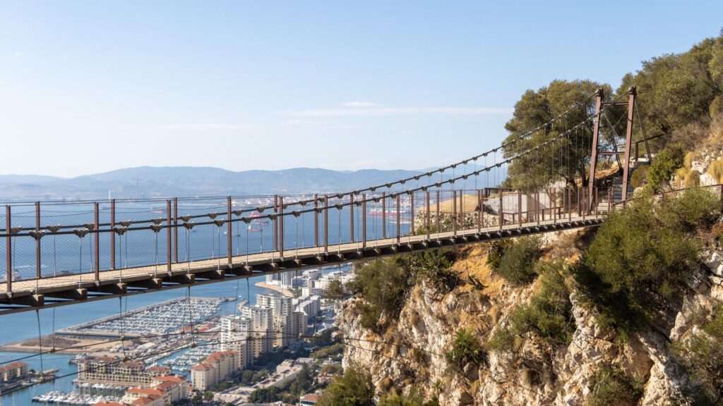 Suspension bridge crossing rocks in Gibraltar.