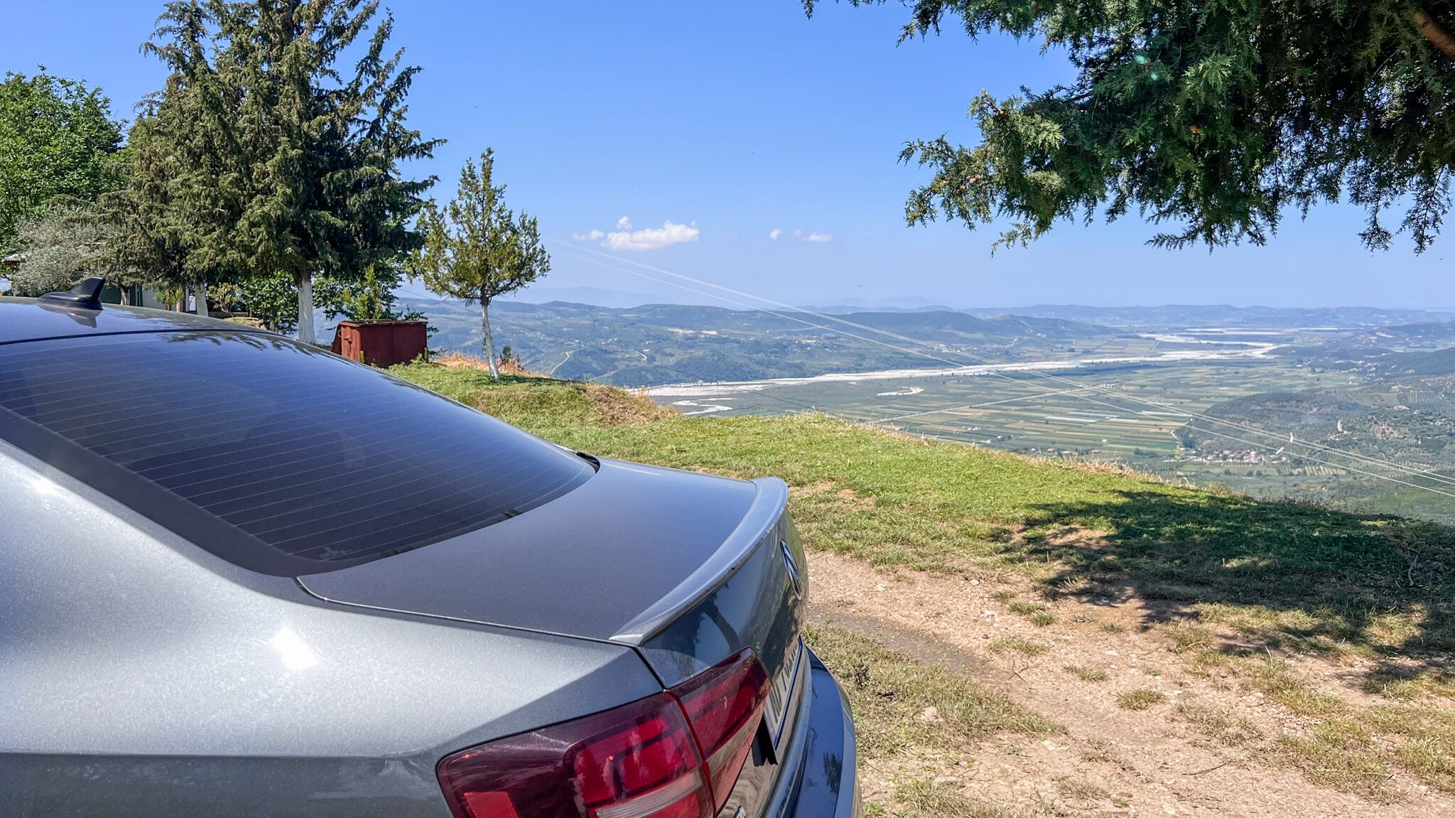 Grey car parked at viewpoint in Albania.