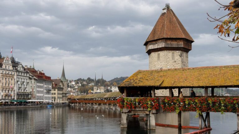 Covered bridge over river during 24 hours in Lucerne.