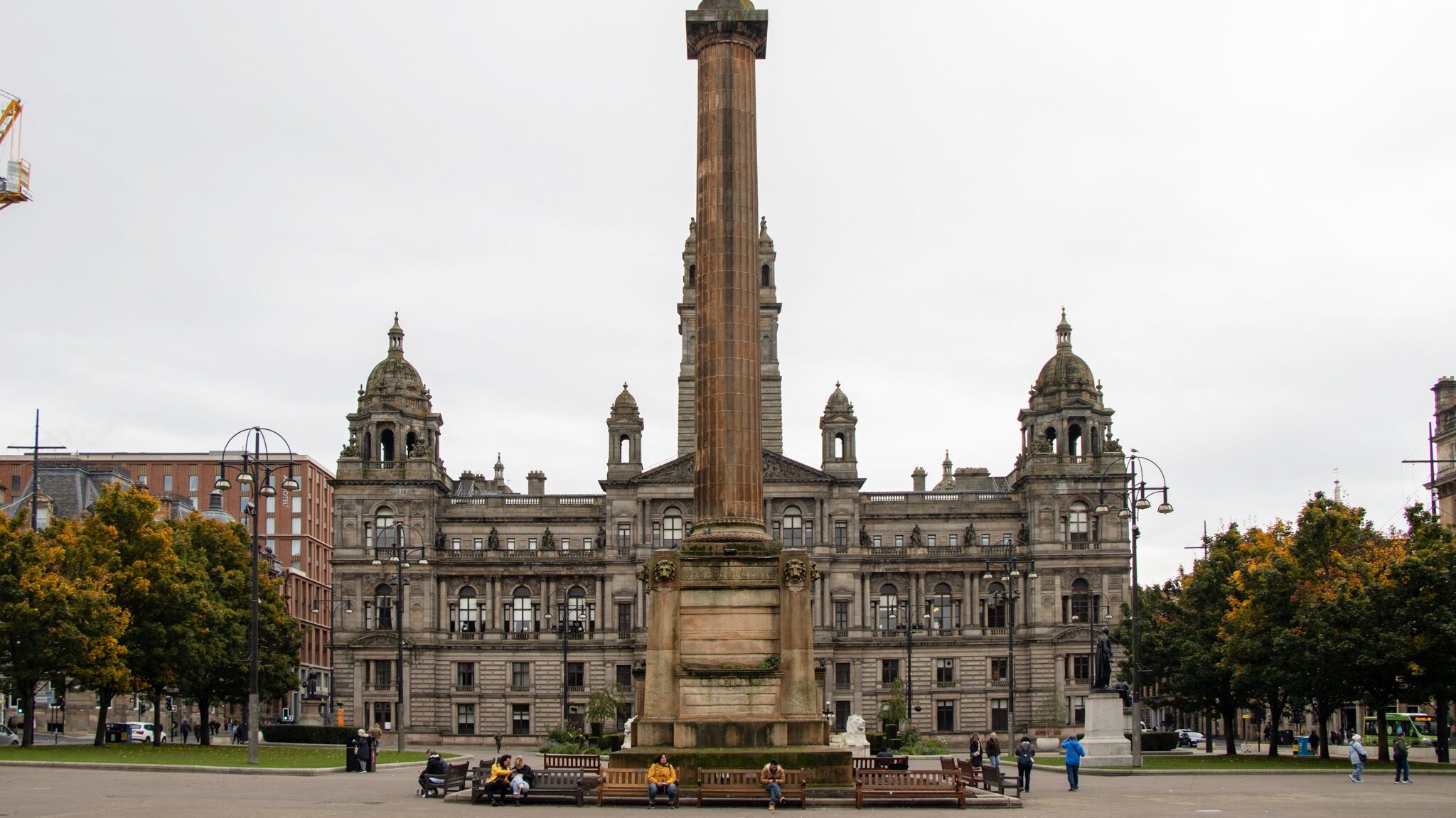 Large square in Glasgow with monument.