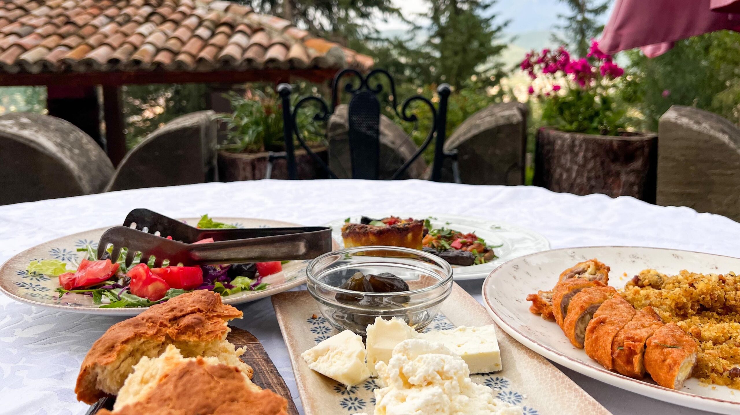 Outside table with traditional Albanian food.