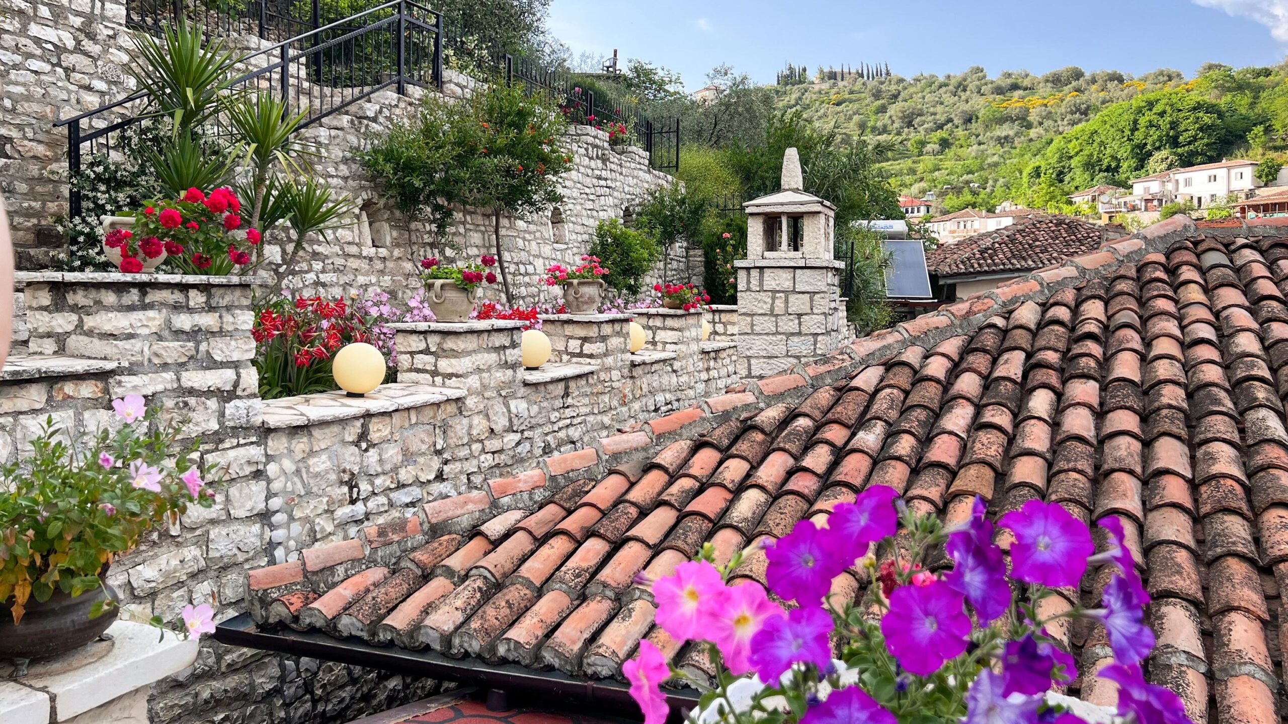 View of hotel rooftop with flowers.