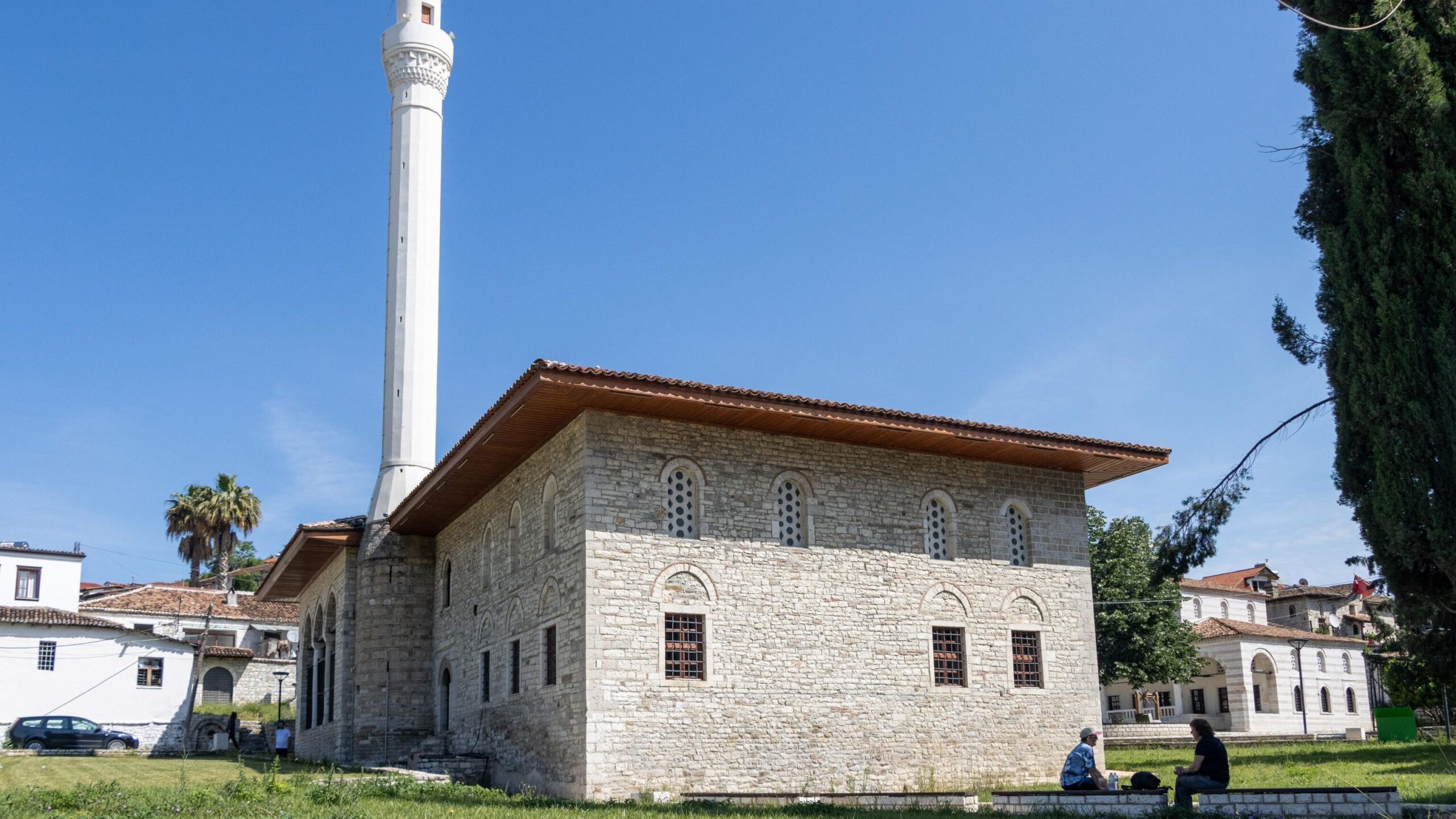 Historic mosque with tall tower in Berat.