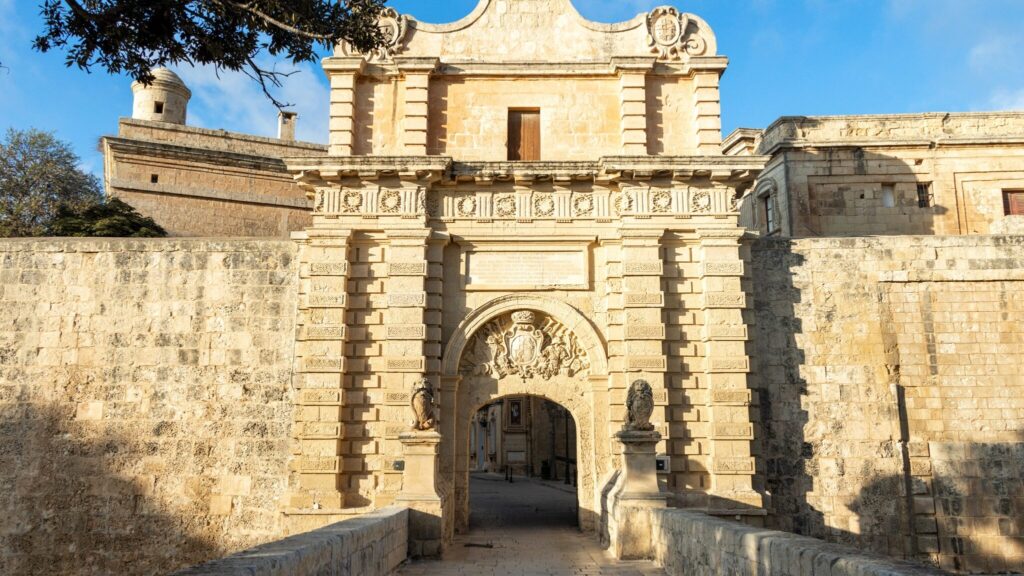 Large entry gate at the end of bridge, is Mdina worth visiting.