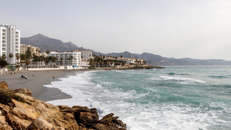 Dark sand beach at Nerja.