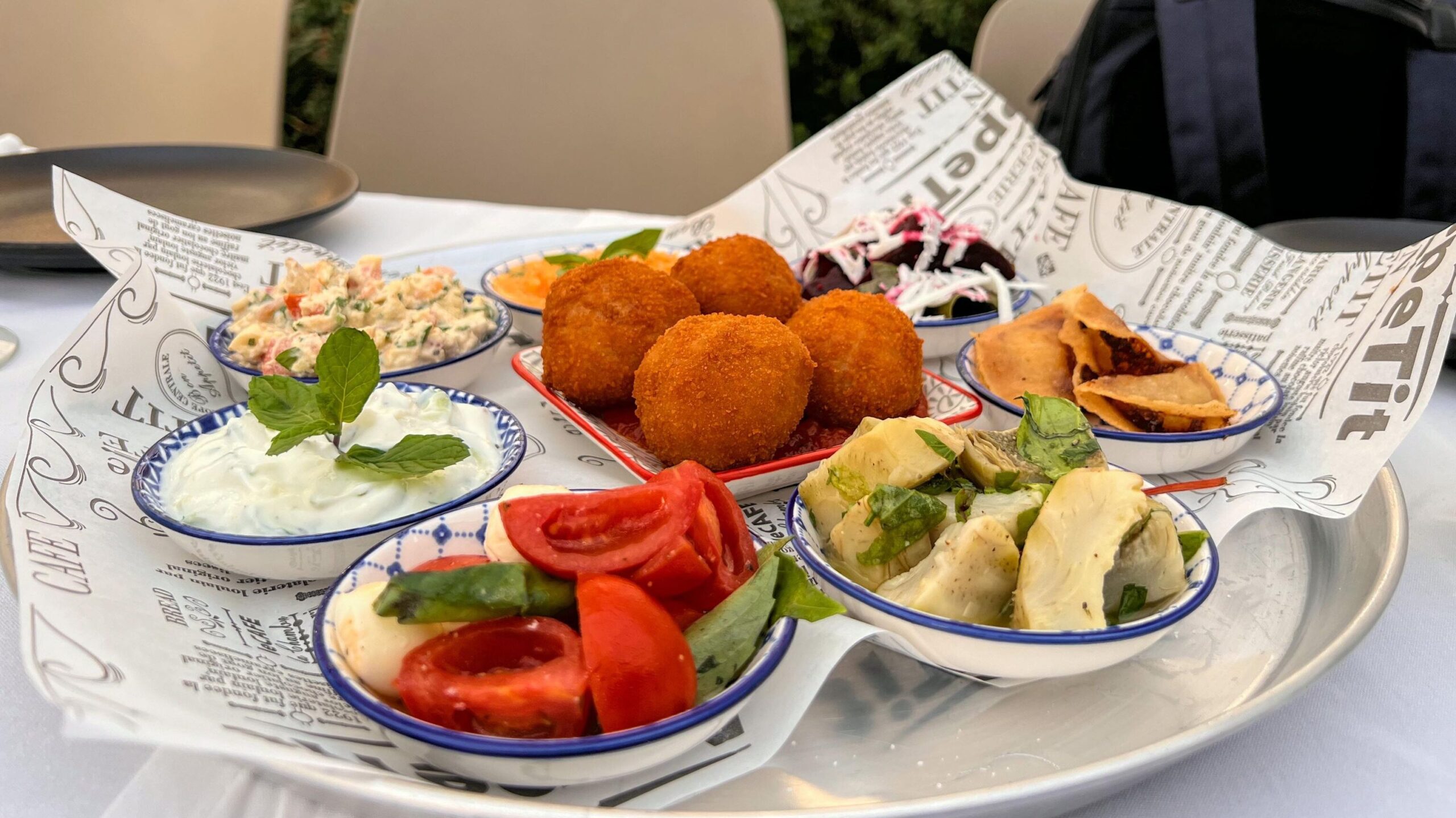 Selection of small plates at restaurant in Jerusalem. 