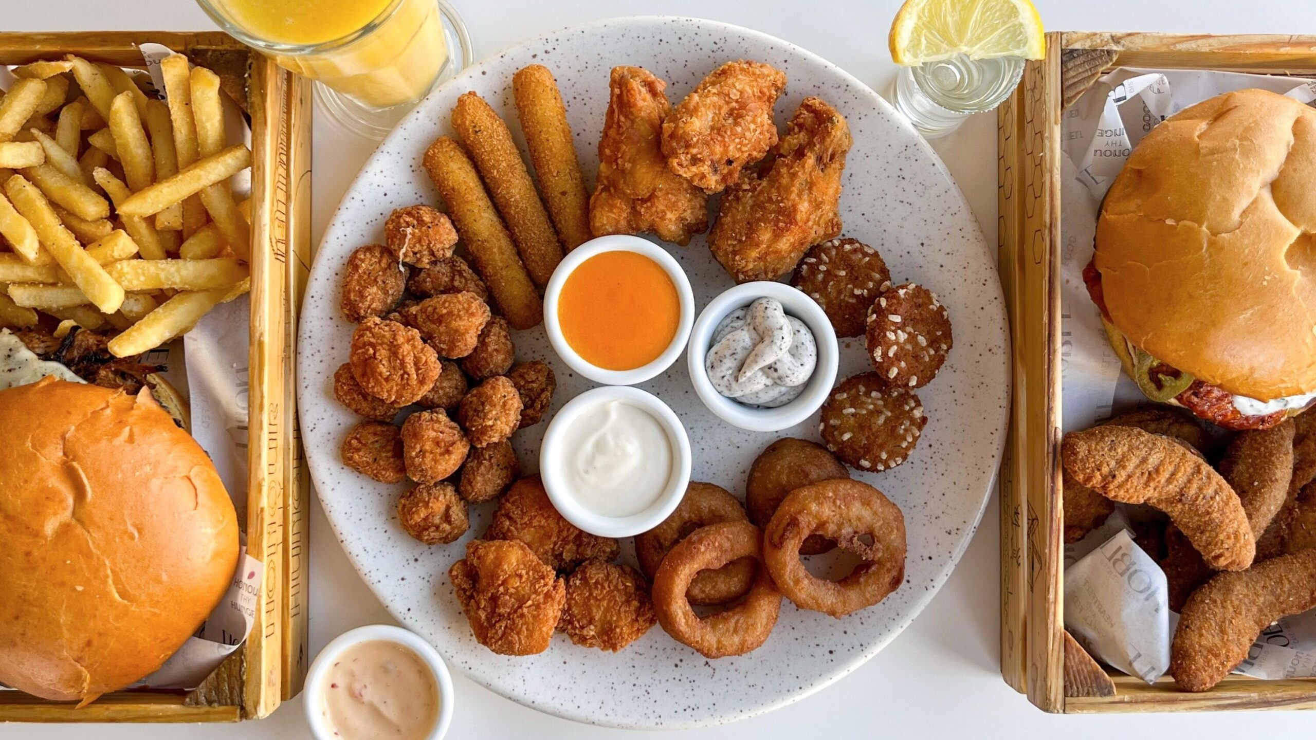 Two burgers and sharing platter.