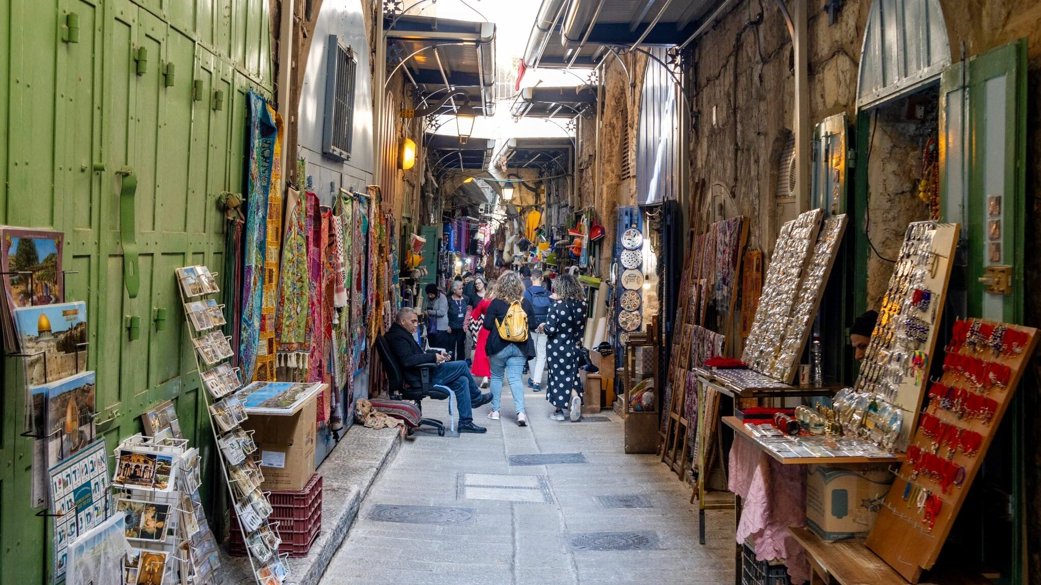 Street in the old city of Jerusalem with market stalls.