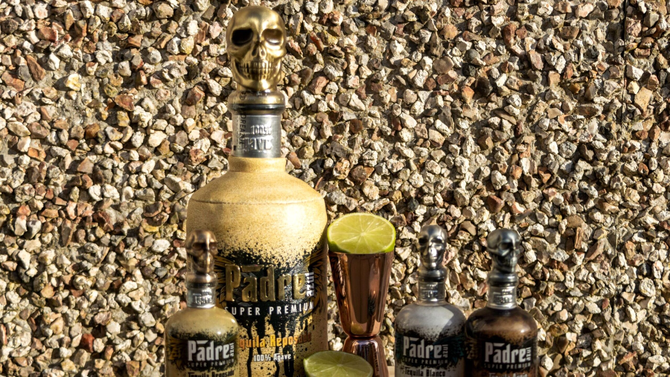 Leather bound bottle of tequila and miniatures. 