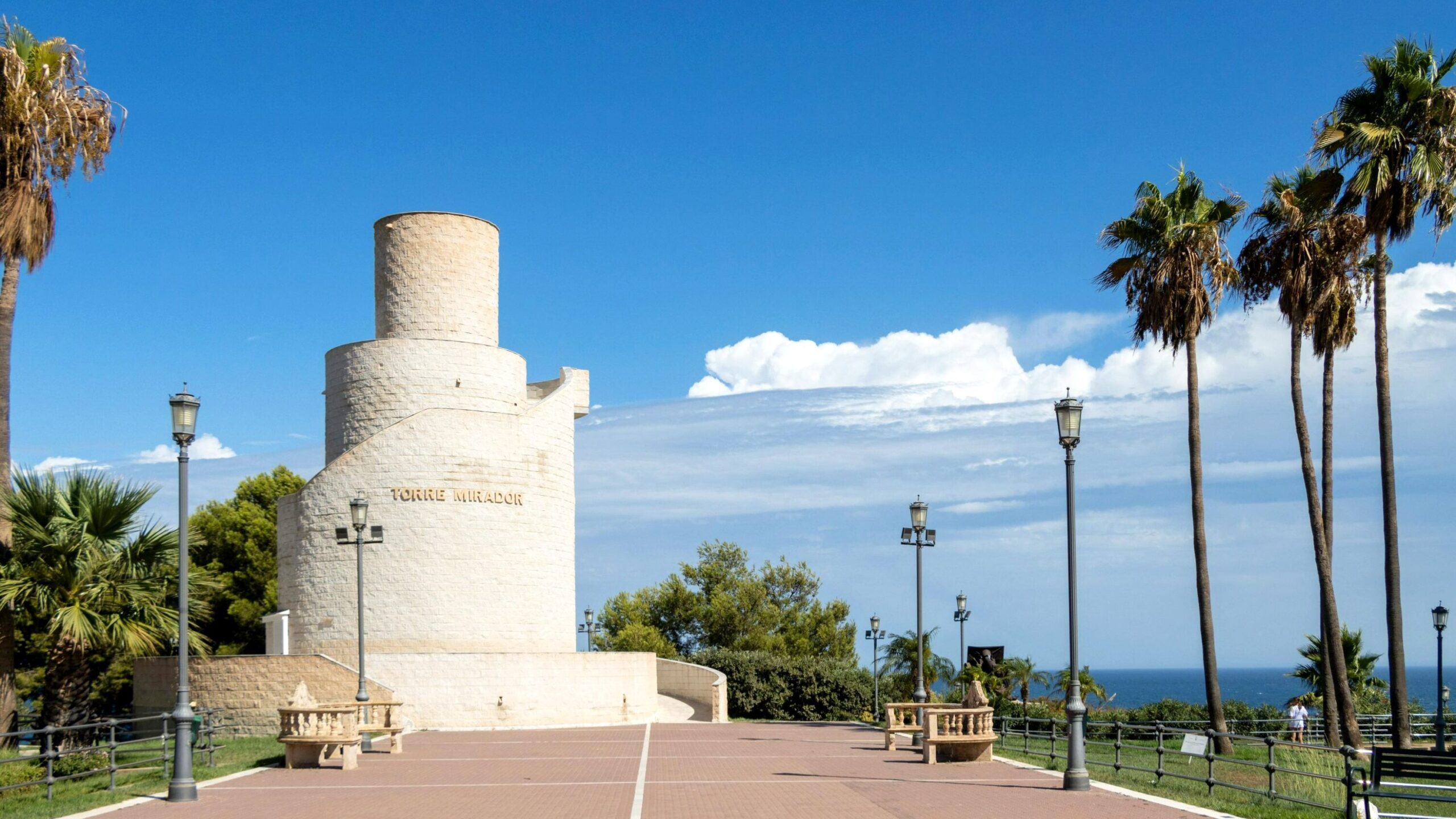 Park in Torremolinos with white tower.