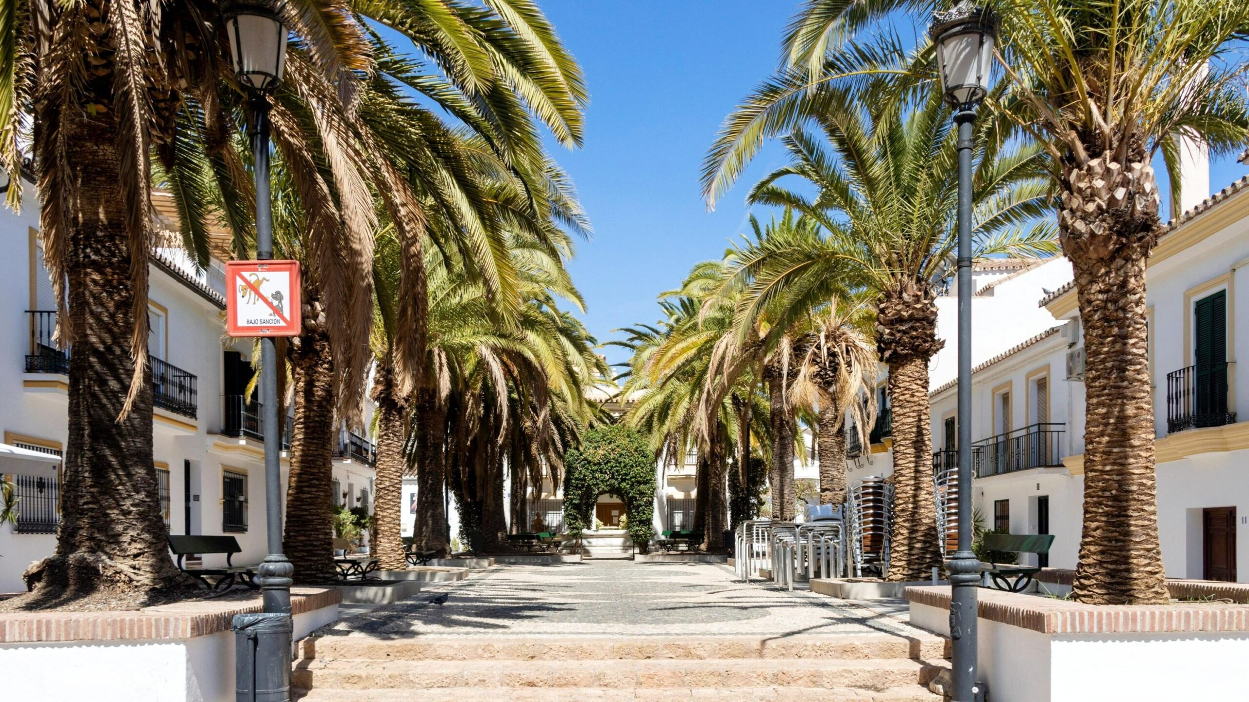 Small plaza with steps in white village. 