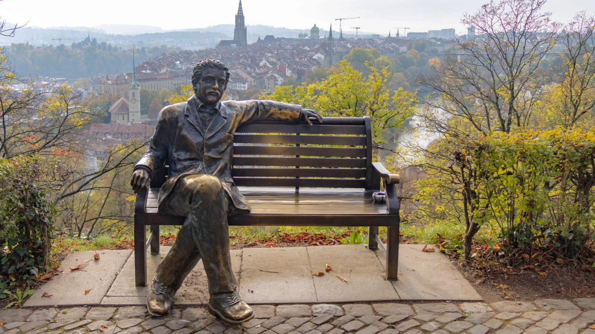 Park bench in Bern with Einstein sitting on it.