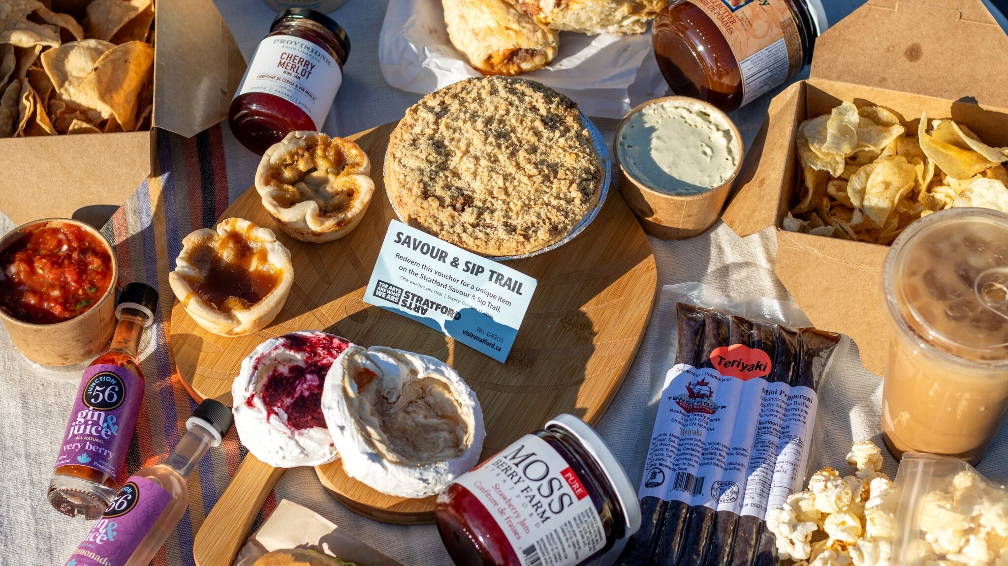 Selection of picnic items on table.