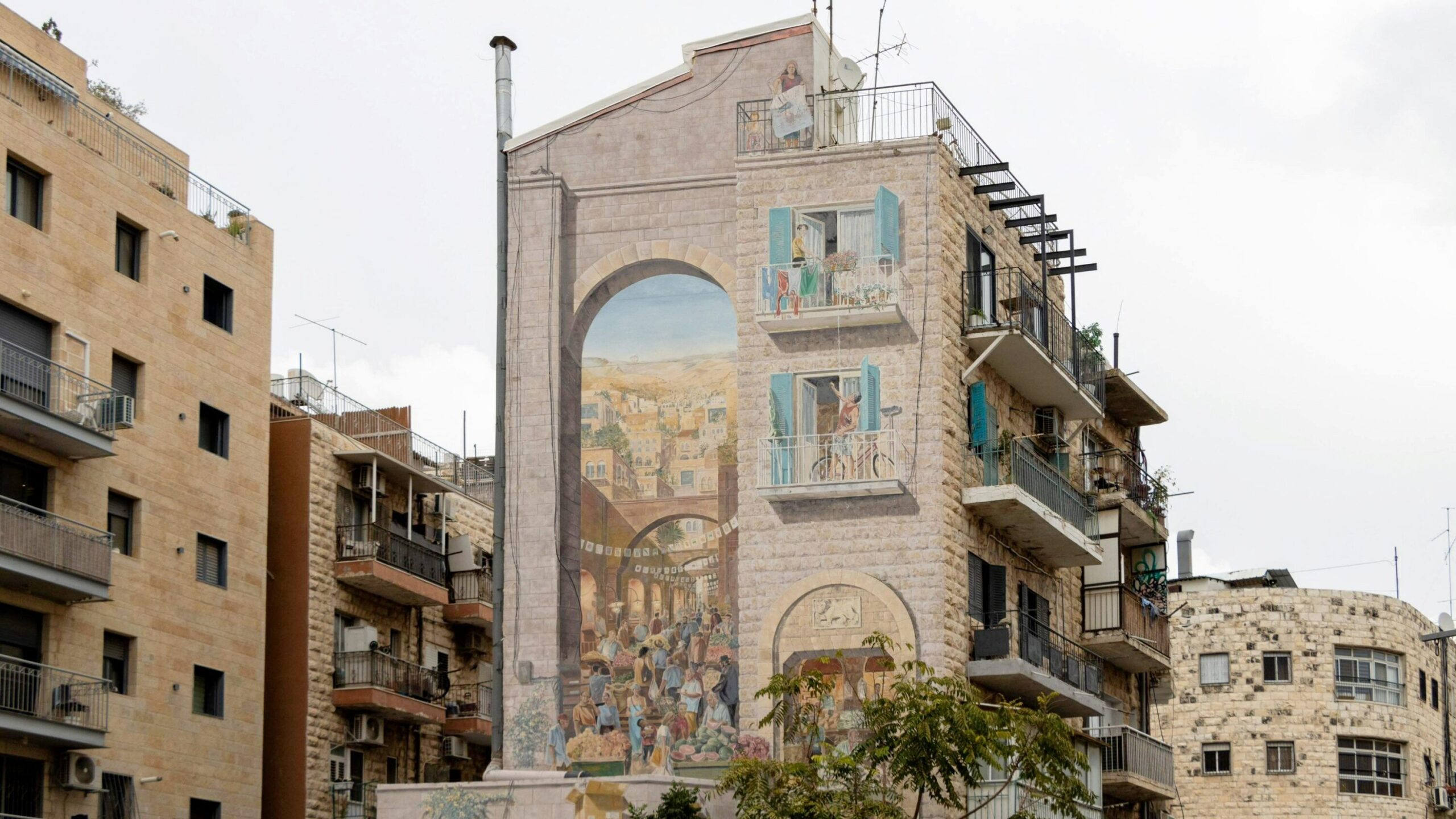 Side of a building painted with picture.