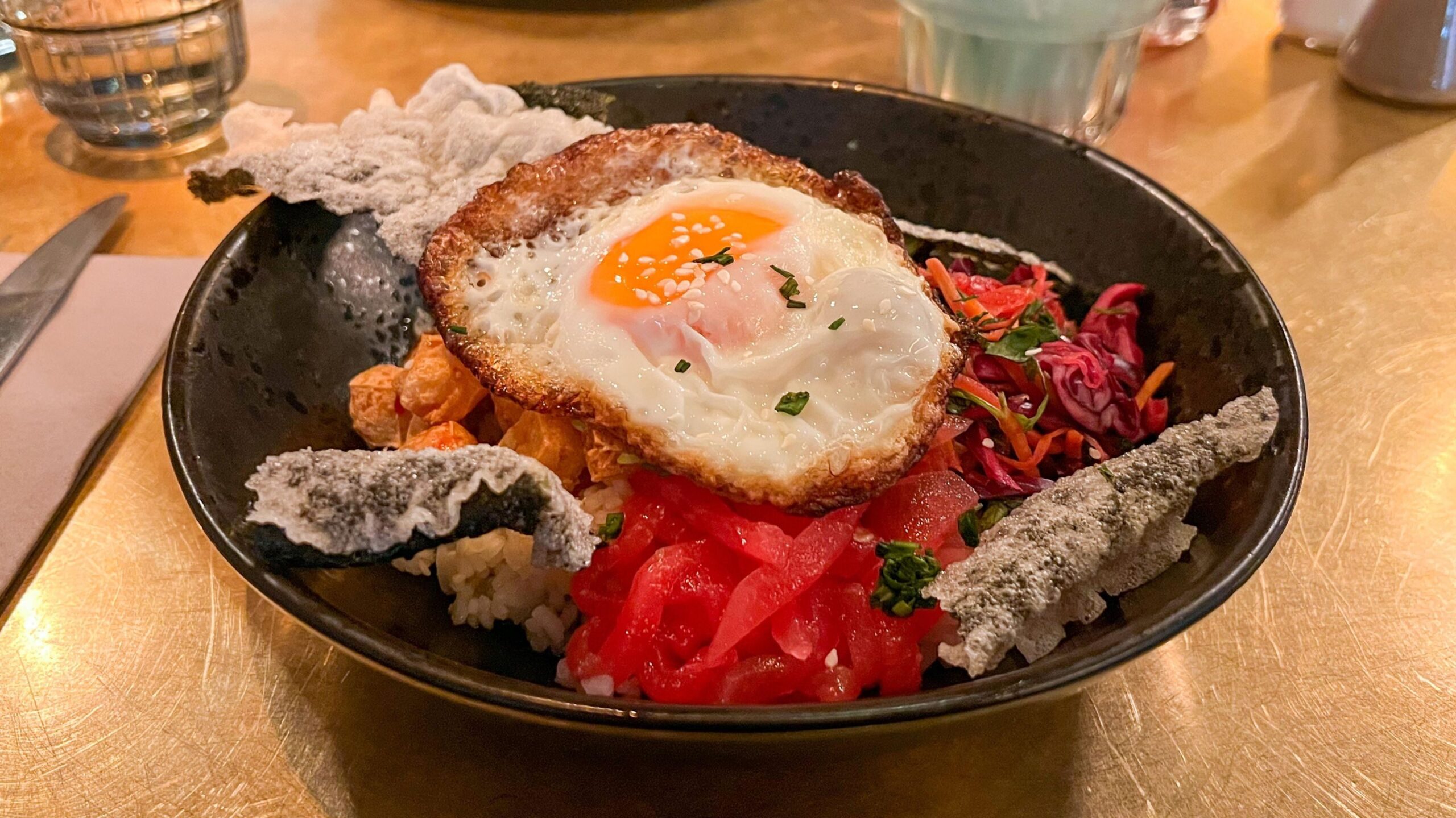 Noodle dish with fried egg.