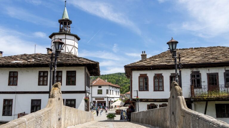 Stone bridge leading to village in Bulgaria.