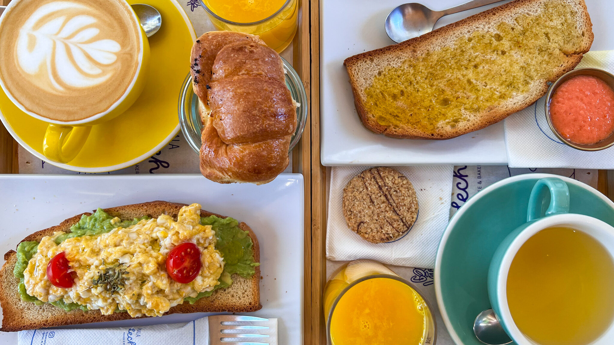 Open-faced toasts with coffee and orange juice..