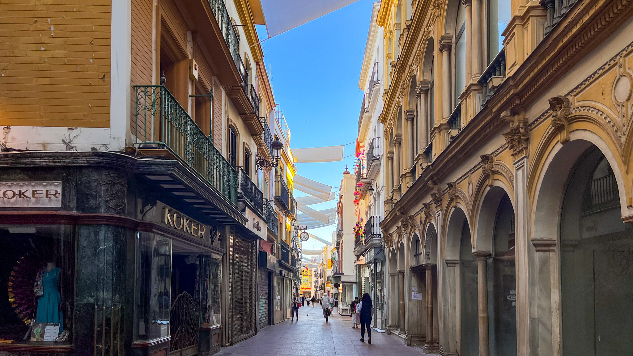 Shopping street in Sevilla near sunrise. 