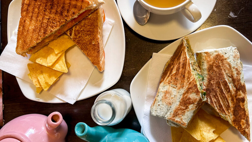 Teas with toastie and falafel wrap.
