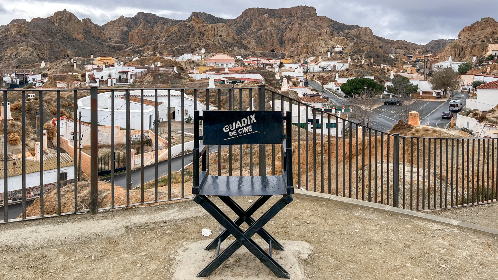 Directors chair facing neighbourhood in Guadix. 