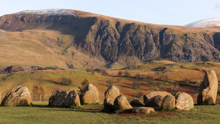 Small stone circle in hills of Lake District.