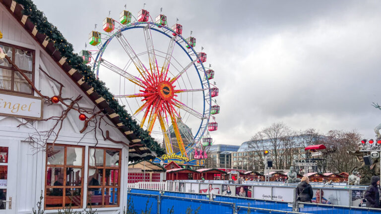 Ferris Wheel next to skating rink best Christmas markets in Berlin.