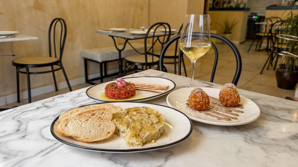 Three modern tapas dishes served in Mediterranean bistro.