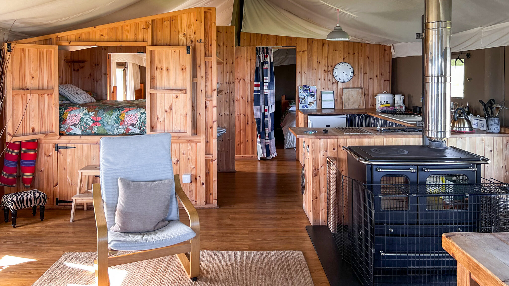 Interior of safari lodge with wood paneling. 