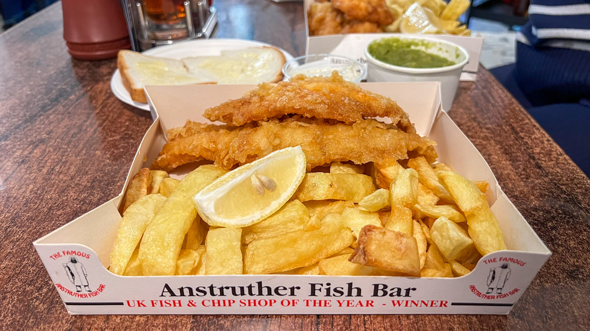 Paper box with fish and chips in Anstruther. 