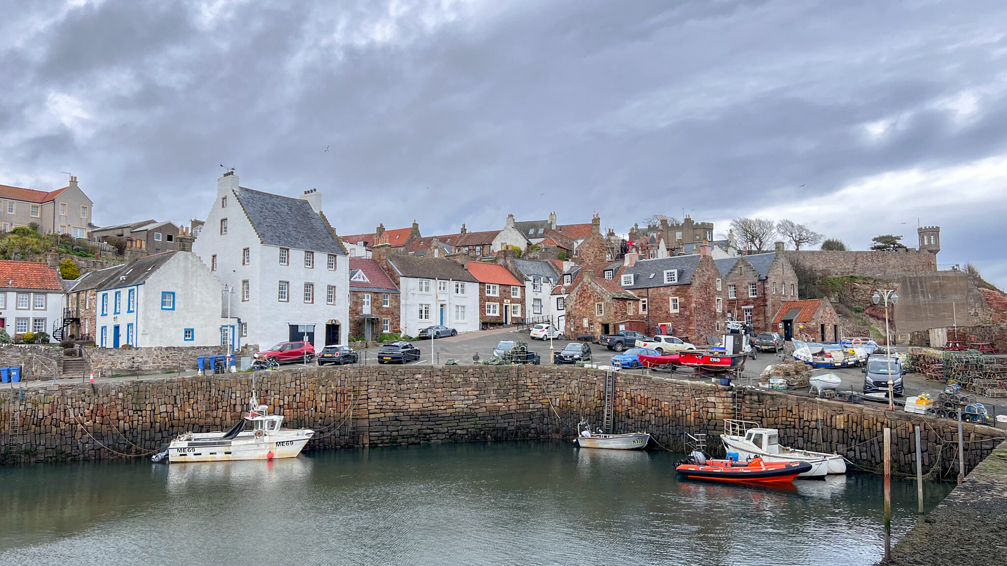 View of harbour at Crail on cloudy day.