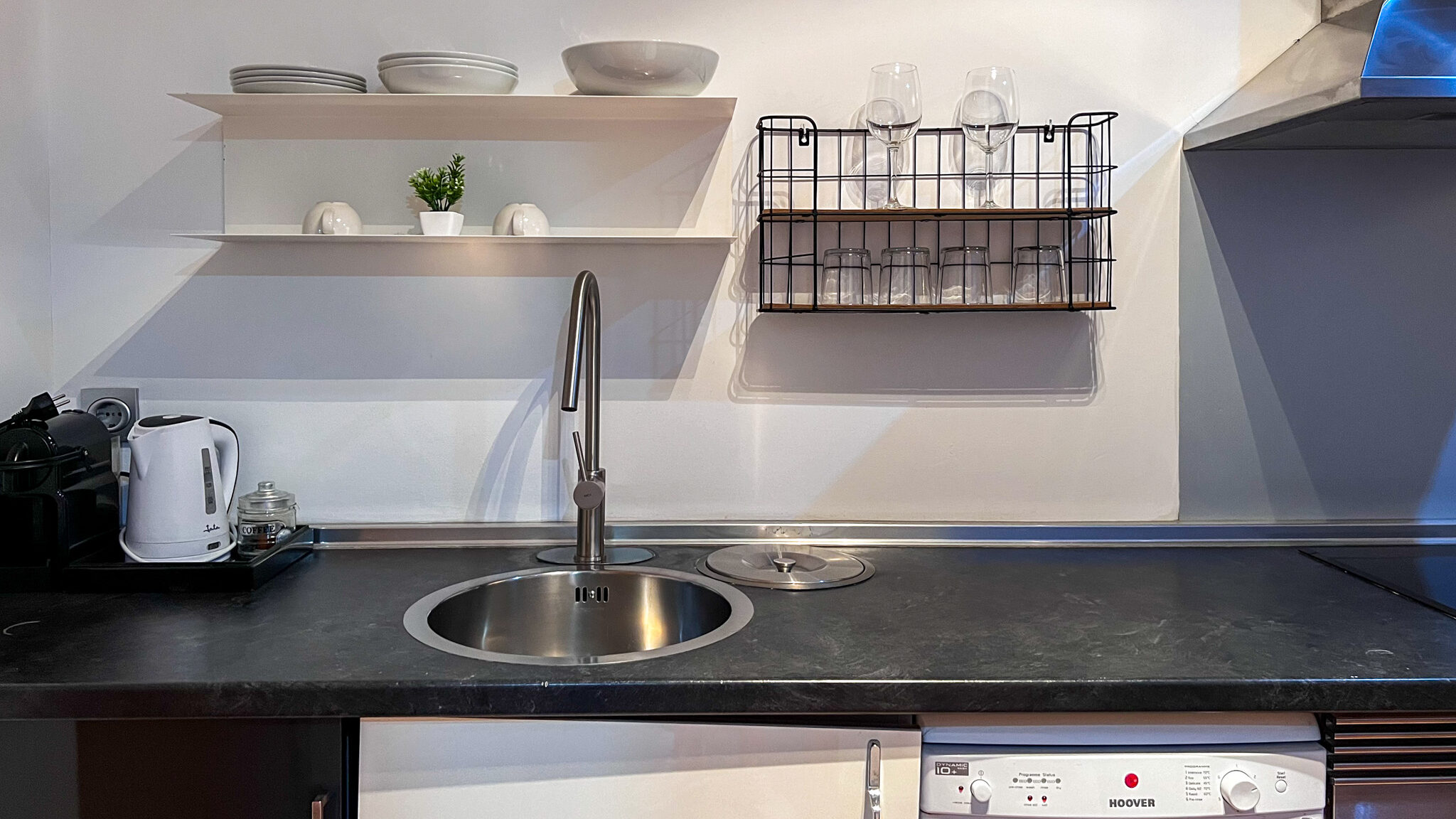 Kitchen inside studio apartment.